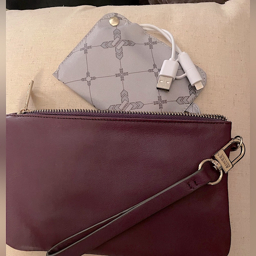 Aimee Kestenberg leather wristlet with built in phone charger battery bank